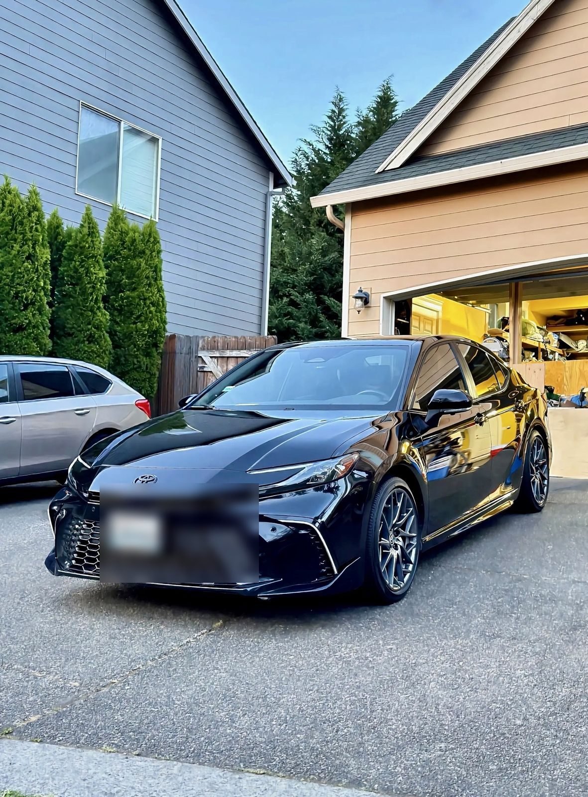 Black Toyota Camry with deep gloss after detailing